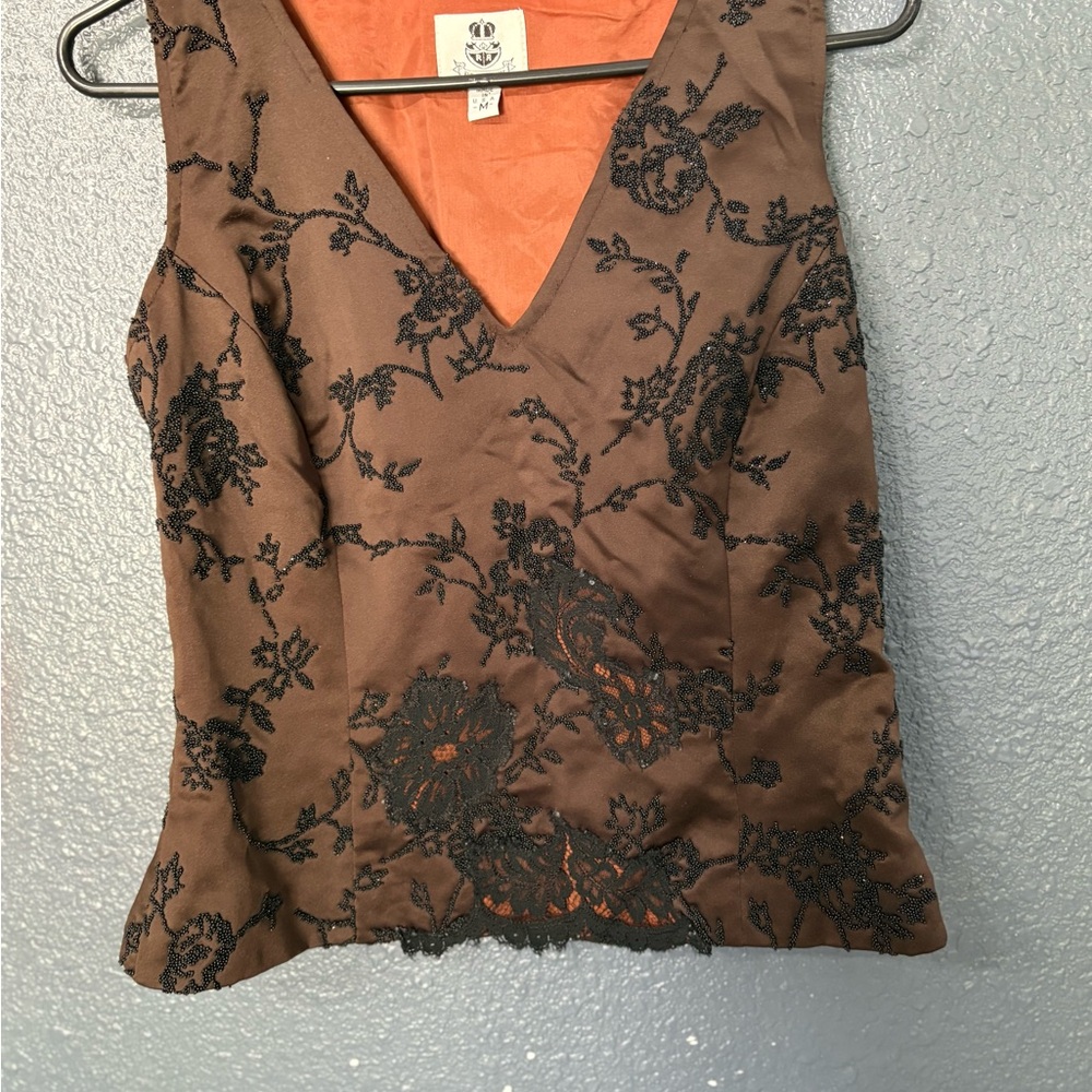 Elegant Brown Sleeveless Blouse with Black Embroidery